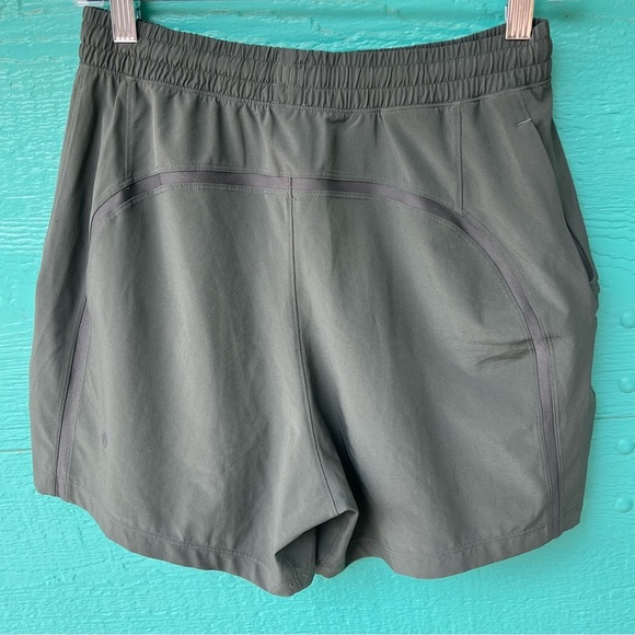 LULULEMON OLIVE GREEN SHORTS 5” INSEAM SIDE ZIPPER POCKET SIZE SMALL - Picture 5 of 12